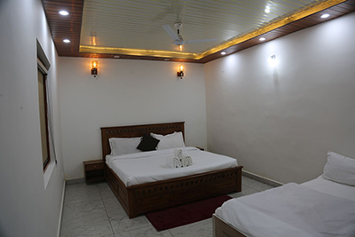 Premium lighting and AC suite decor at Hotel Kuber Residency Dwarka Sector 9