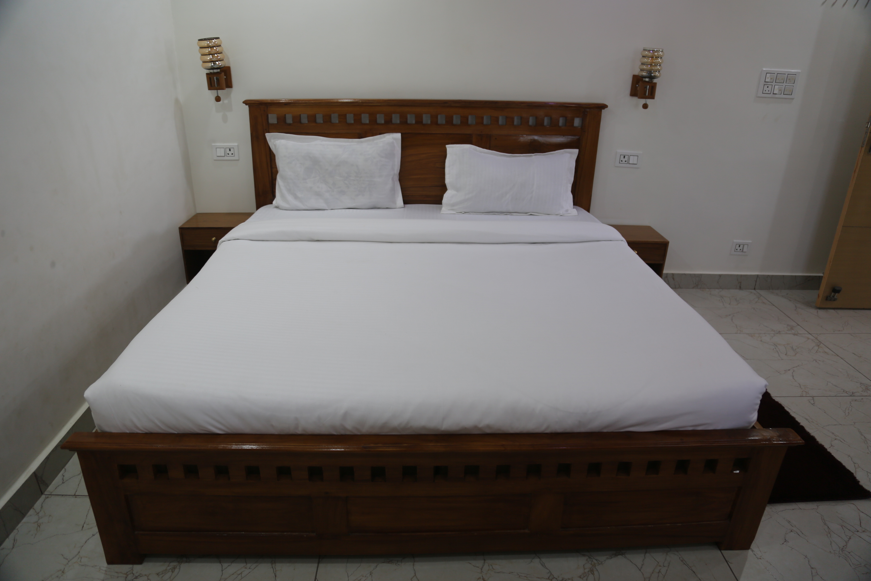 Deluxe AC Room spacious setup at Hotel Kuber Residency Dwarka New Delhi